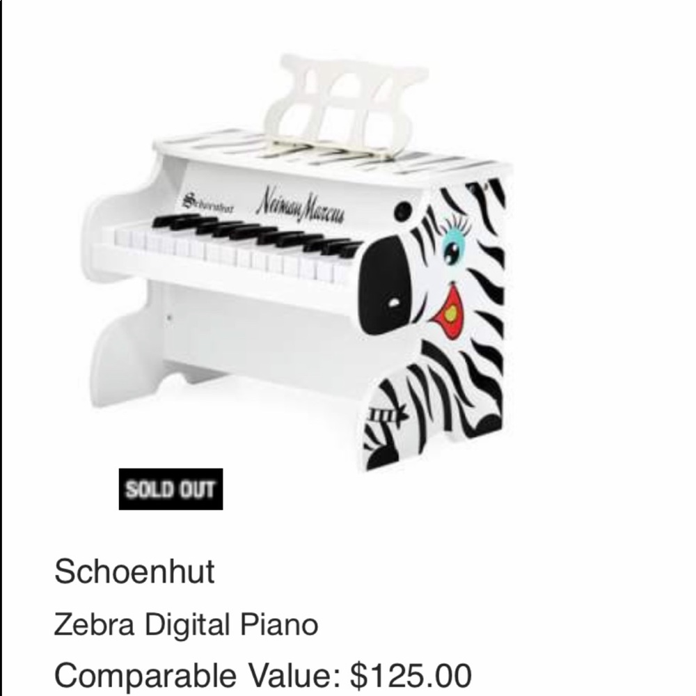 Like NEW Zebra Neiman Marcus piano
